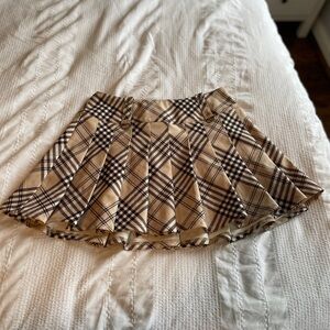 TIGER MIST Pleated plaid/tartan skirt.